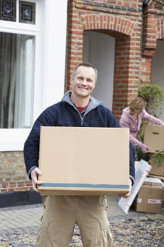 Removal team handling home moves in Colliers Wood near local residential streets