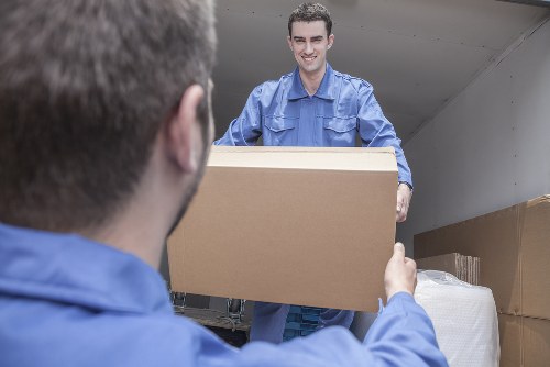 Removal van and moving team ready for same day house removals in Colliers Wood