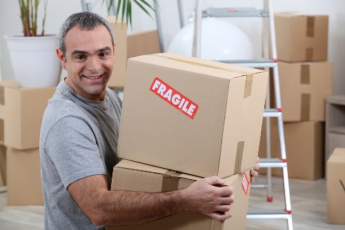 Packing boxes and moving supplies prepared for a Colliers Wood home move