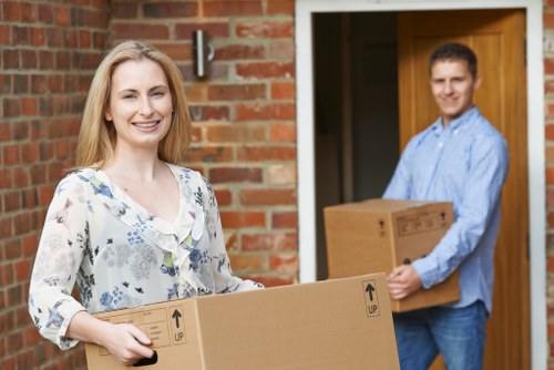 Careful loading of furniture for a home move in Colliers Wood