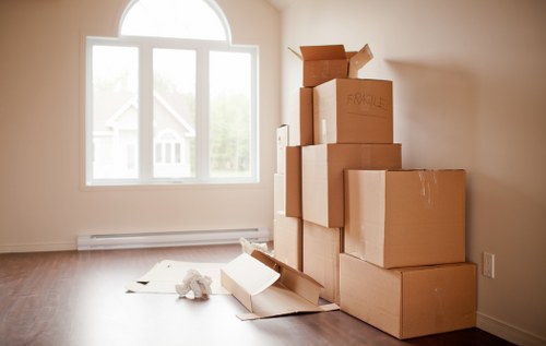 Packed moving boxes and furniture prepared for transport