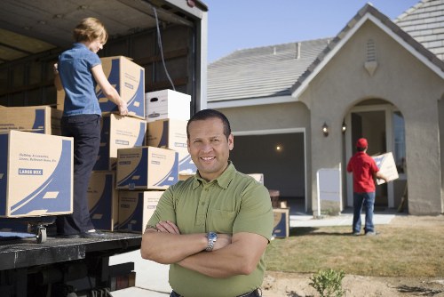 Packing boxes and furniture ready for local storage