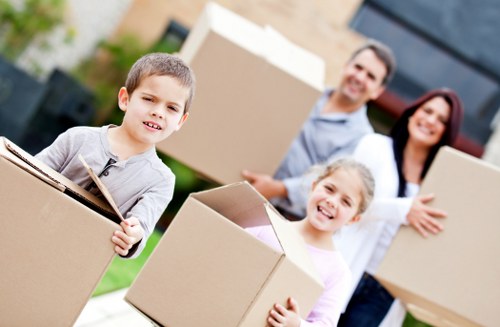 Loading furniture into a moving truck for a Colliers Wood move