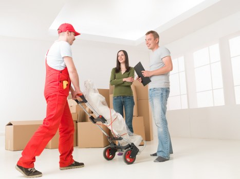 Packed boxes and household items prepared for transport in Colliers Wood