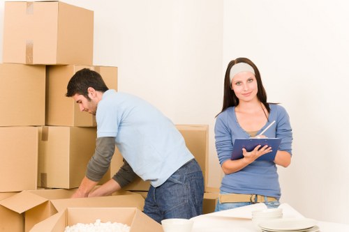 Preparing office furniture and boxes for transport in Colliers Wood