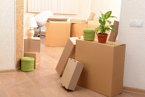 Same day removals team loading furniture for a short notice move near Colliers Wood